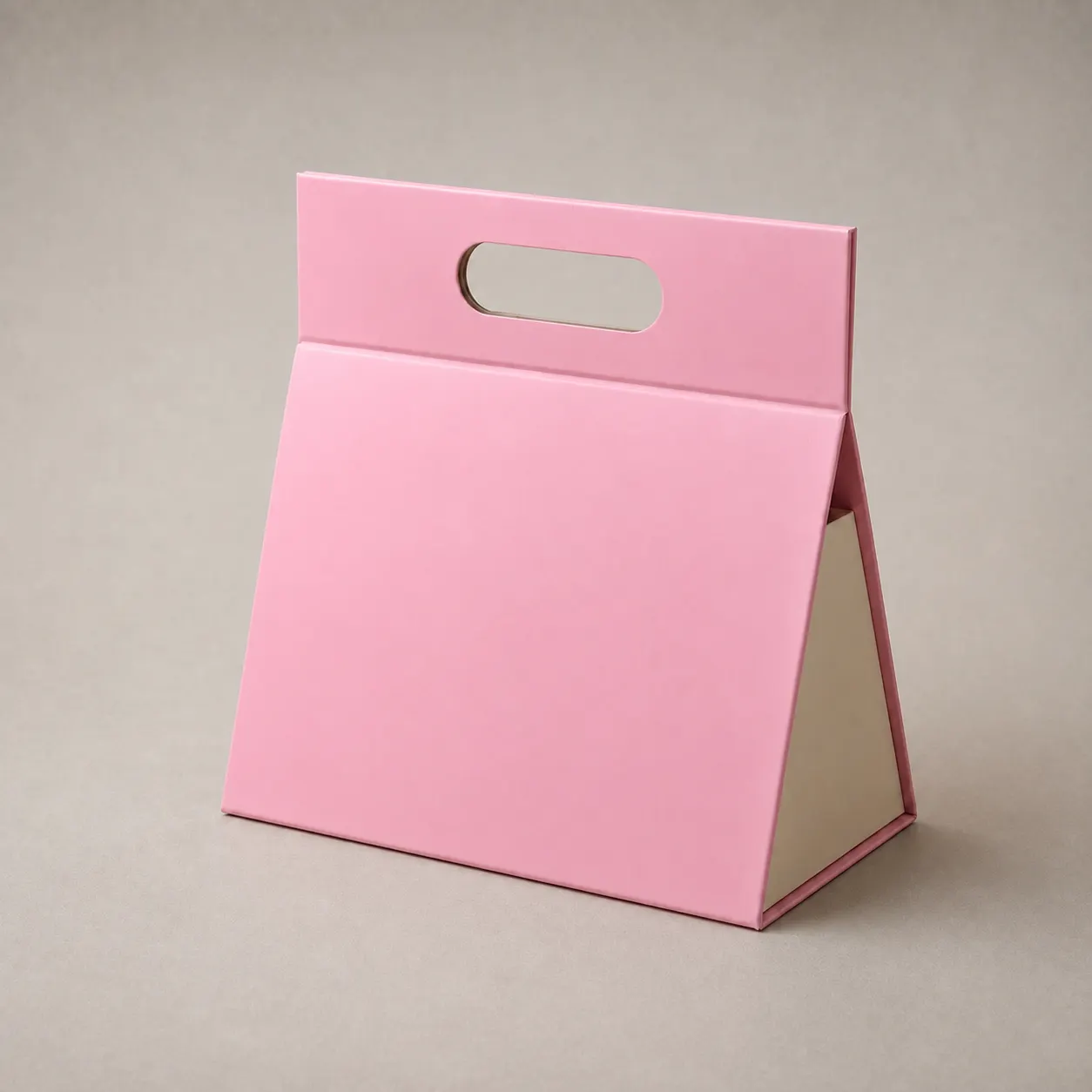 Soft Pink Triangular Handbag-Style Folding Gift Box with Built-In Handle
