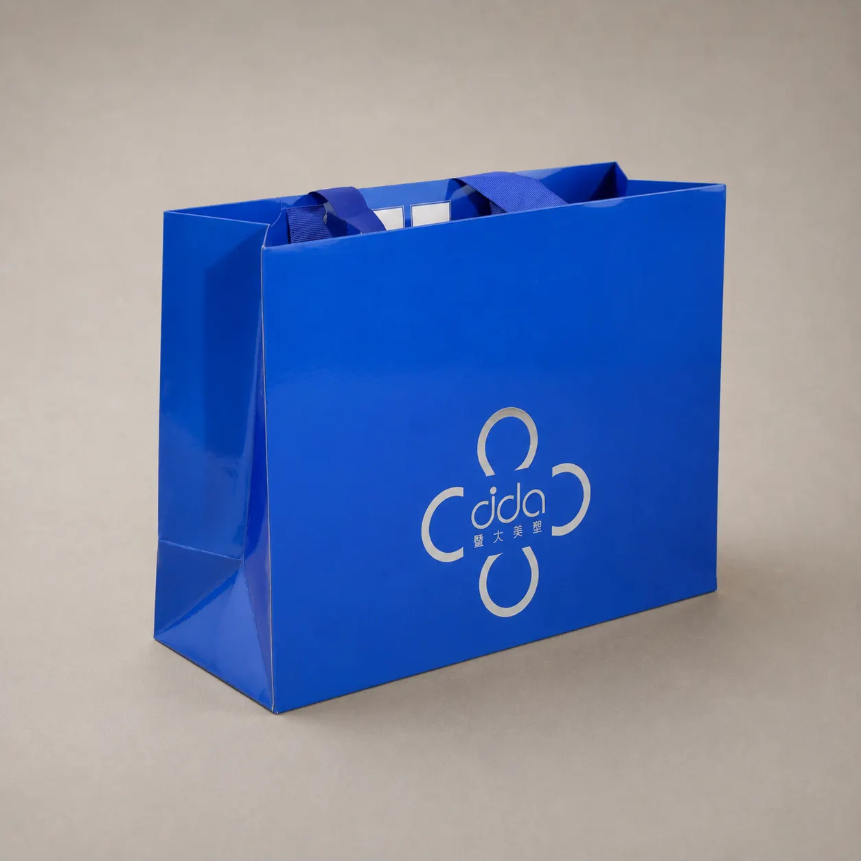Luxury Royal Sapphire Blue High-Gloss Tote Bag with Silver Clover Emblem