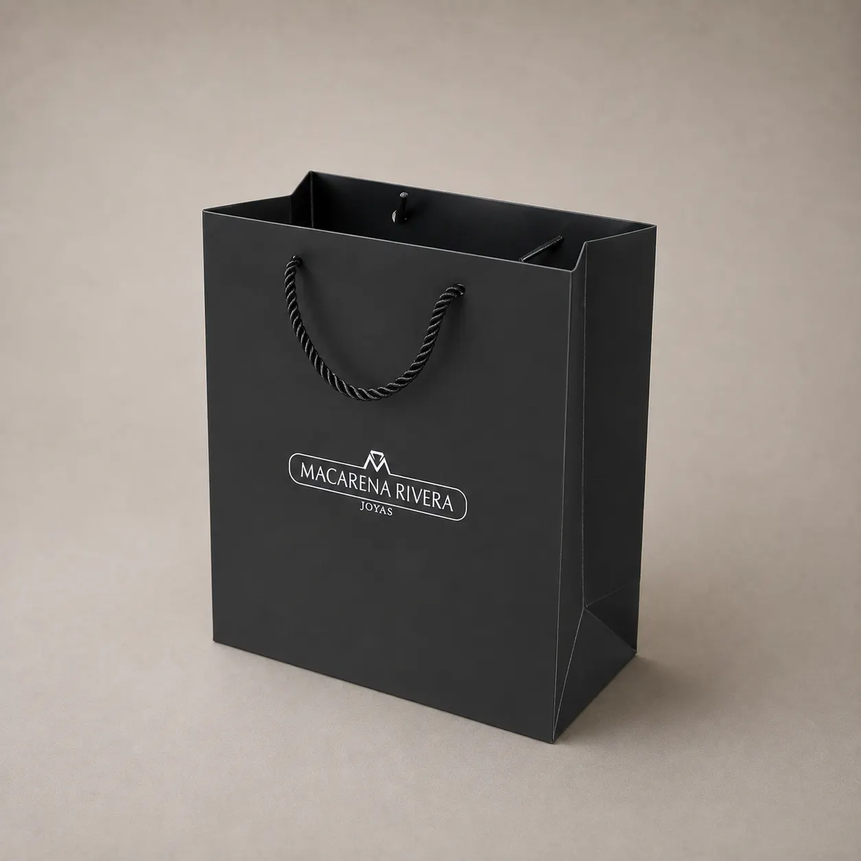 Luxury Pitch Black Paper Tote Bag with Silver Foil Badge